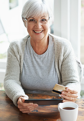 Buy stock photo Happy senior woman, tablet and credit card for online shopping, payment or banking on table at home. Portrait of excited elderly female shopper on technology for ecommerce, purchase or bank app