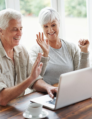 Buy stock photo Happy elderly couple, laptop and waving on video call, internet communication and voip chat at home. Senior man, old woman and wave hello on computer for virtual conversation, contact and connection