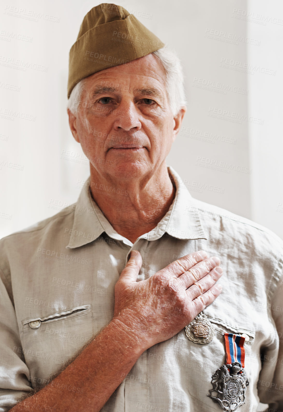 Buy stock photo Senior person, army and veteran in portrait for memories, pride and respect in home for remembering. Mature man, war and hero in retirement with service, medals and uniform as soldier or patriot