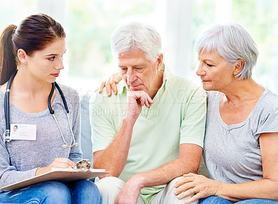 Buy stock photo Senior, couple and doctor with results for man in consultation with advice and support. Sad, patient and therapist in elderly care with news, info or medical notes on hypertension or blood pressure