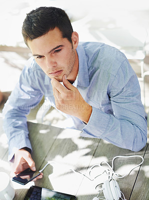 Buy stock photo Man, phone and thinking outdoor at cafe with employee on work break, message and communication. Mobile, technology and idea or wondering, waiting for email and contemplating, business and thoughtful 