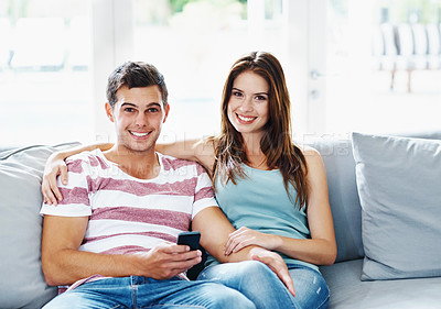 Buy stock photo Portrait couple, living room and relax on sofa for bonding, smile and hug in new apartment for support. Home, happy and commitment for marriage, romantic and relationship for security with love