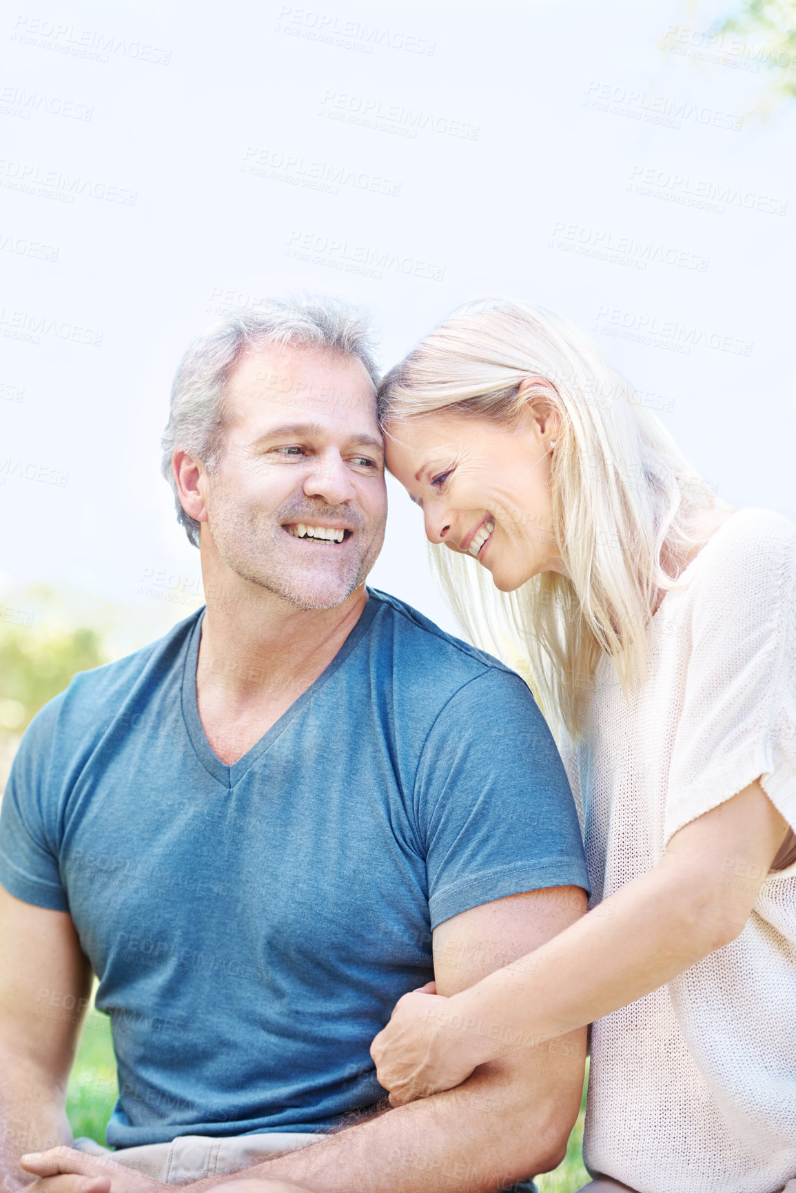 Buy stock photo Love, hug and senior couple in park for bonding, relationship and commitment outdoors on weekend. Happy, retirement and mature man and woman embrace for romance, relaxing and marriage in nature