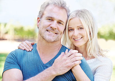 Buy stock photo Mature, couple and portrait embrace in garden with relationship smile for vacation, anniversary or connection. Man, woman and face or countryside forest for New Zealand holiday, together or travel