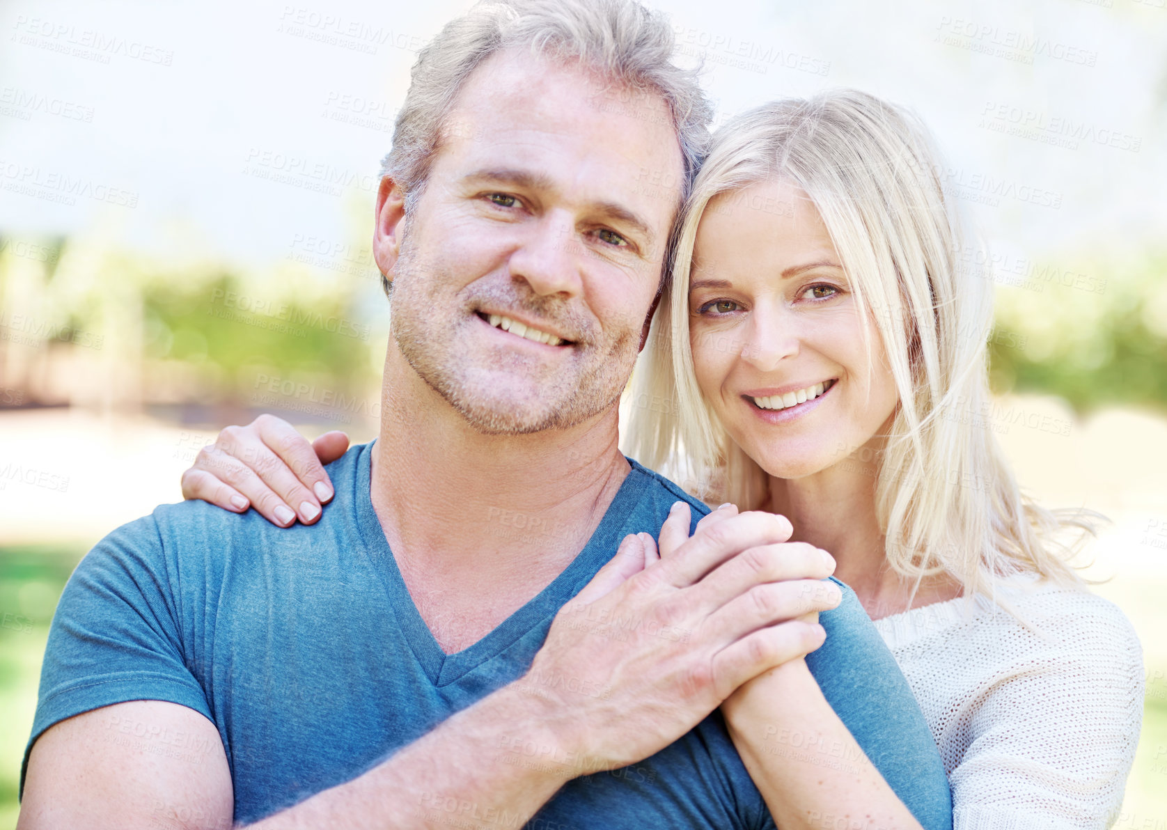 Buy stock photo Mature, couple and portrait embrace in garden with relationship smile for vacation, anniversary or connection. Man, woman and face or countryside forest for New Zealand holiday, together or travel