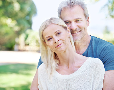 Buy stock photo A lovely mature couple enjoying a day out together in the park