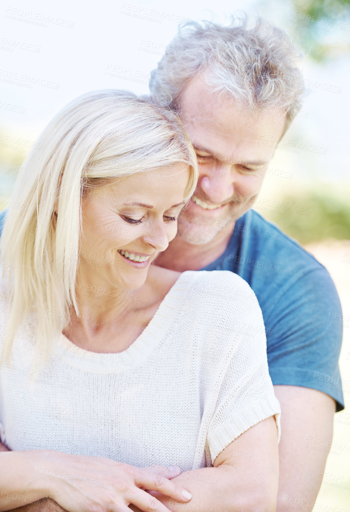 Buy stock photo Happy, hug and senior couple in garden for bonding, relationship and commitment outdoors on weekend. Love, retirement and mature man and woman embrace for romance, relaxing and marriage in nature