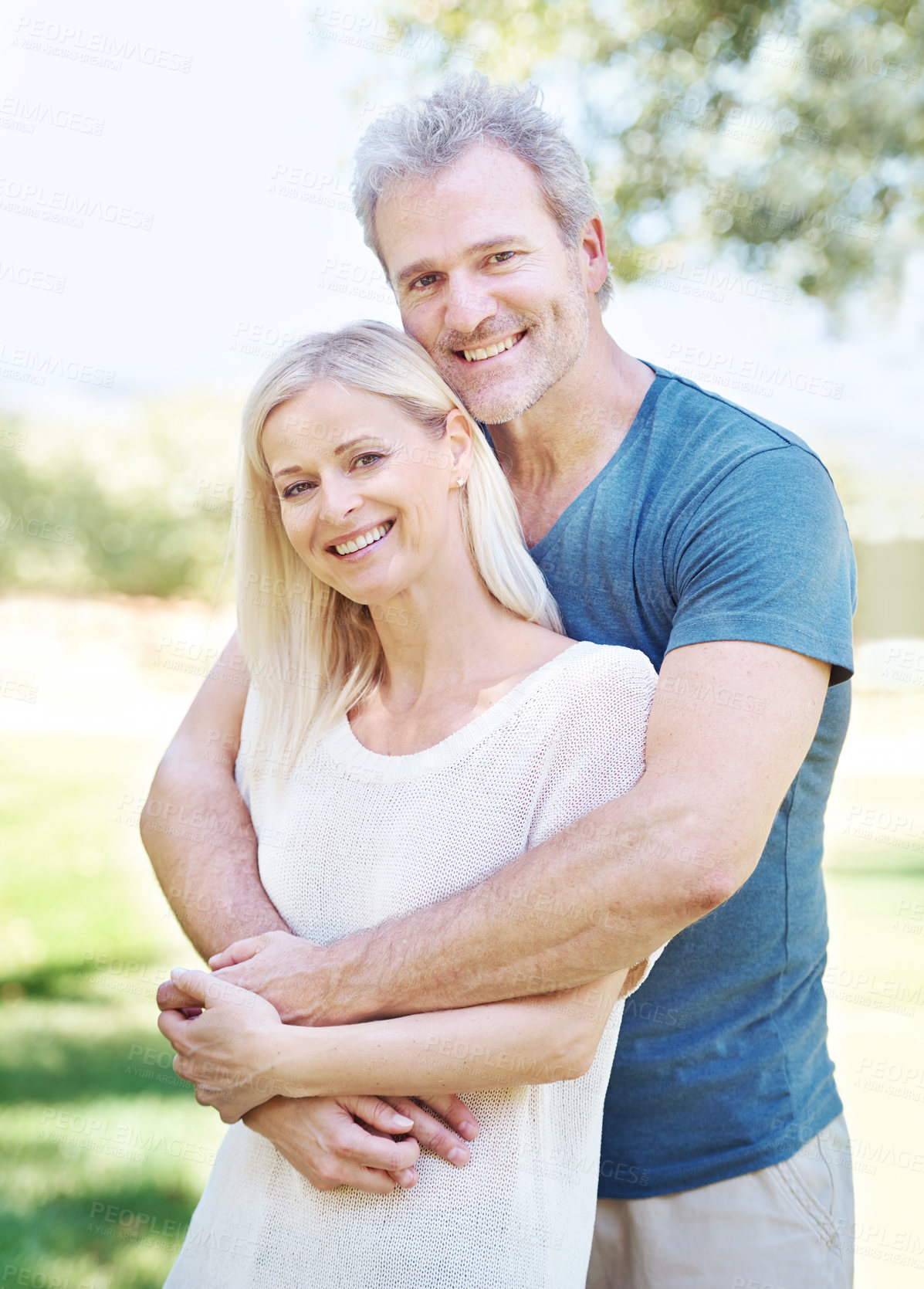 Buy stock photo A lovely mature couple enjoying a day out together in the park