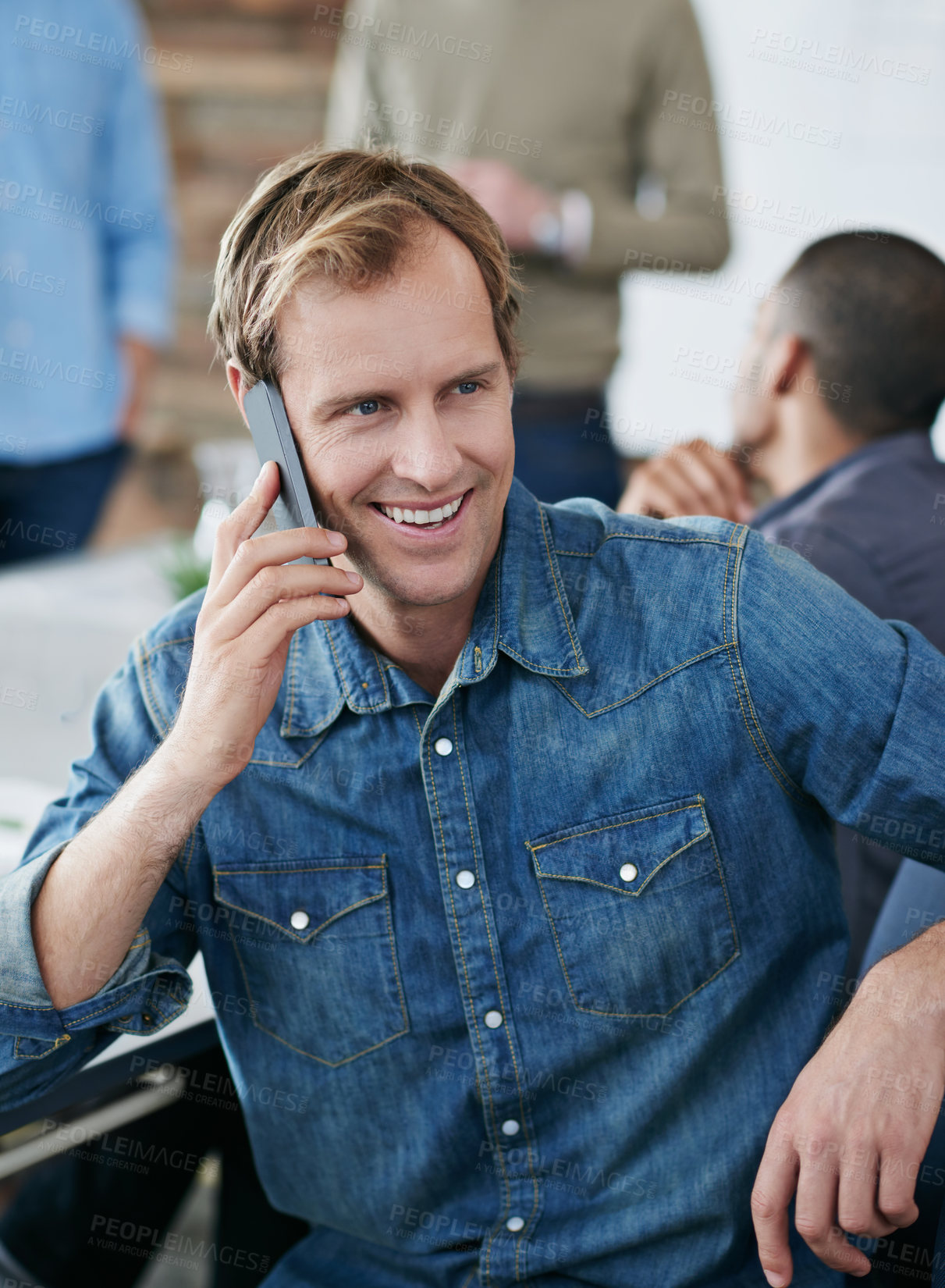 Buy stock photo Happy man, phone call and meeting with discussion in boardroom for networking or chatting at office. Creative male person with smile on mobile smartphone for communication or conversation in startup