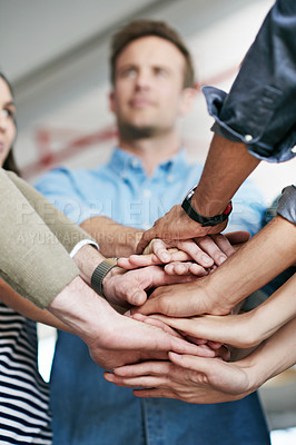 Buy stock photo Group, team and unity with hands together at office for collaboration, synergy or agreement. Closeup of people or creative employees piling for motivation, help or startup in solidarity at workplace
