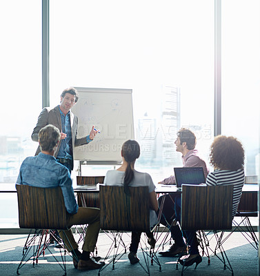 Buy stock photo Meeting, education and whiteboard with a business man in the boardroom for training or coaching presentation. Workshop, management or leadership with a male employee teaching to his team in an office
