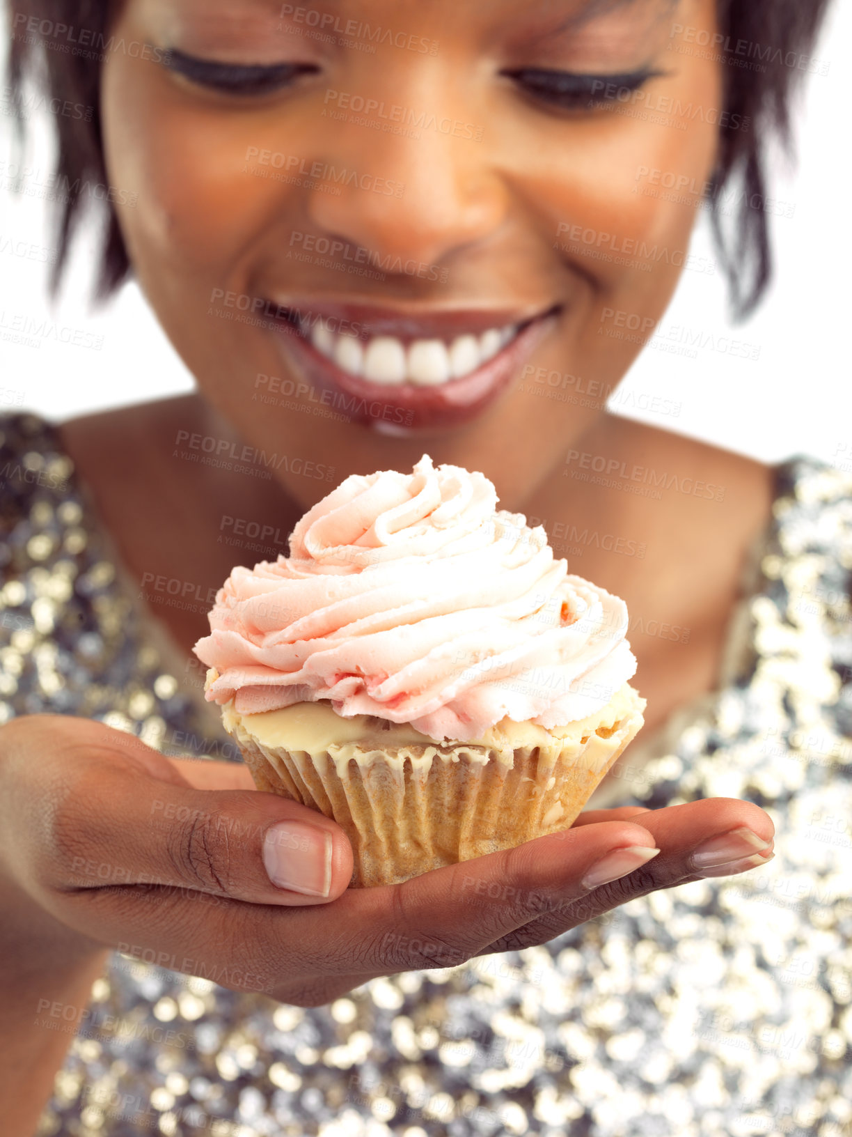 Buy stock photo Thinking, woman and smile with cupcake in studio for sugar snack, sweet treat and junk food. Frosting, cake and person with dessert in hand for unhealthy, nutrition and cherry on white background