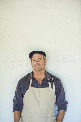 Buy stock photo Portrait, man and cafe owner on wall background with confident startup business manager on mockup space. Face, entrepreneur and mature professional in apron at restaurant for seller career in Germany
