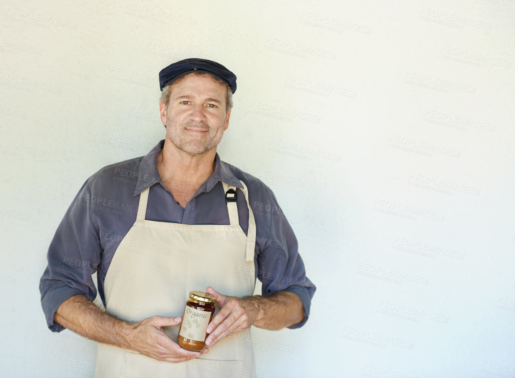 Buy stock photo Man, portrait and happy with organic jam for biodiversity,  sustainability and eco friendly in home. Preserver, smile and natural fruit spread for health, quality and wellness on white background