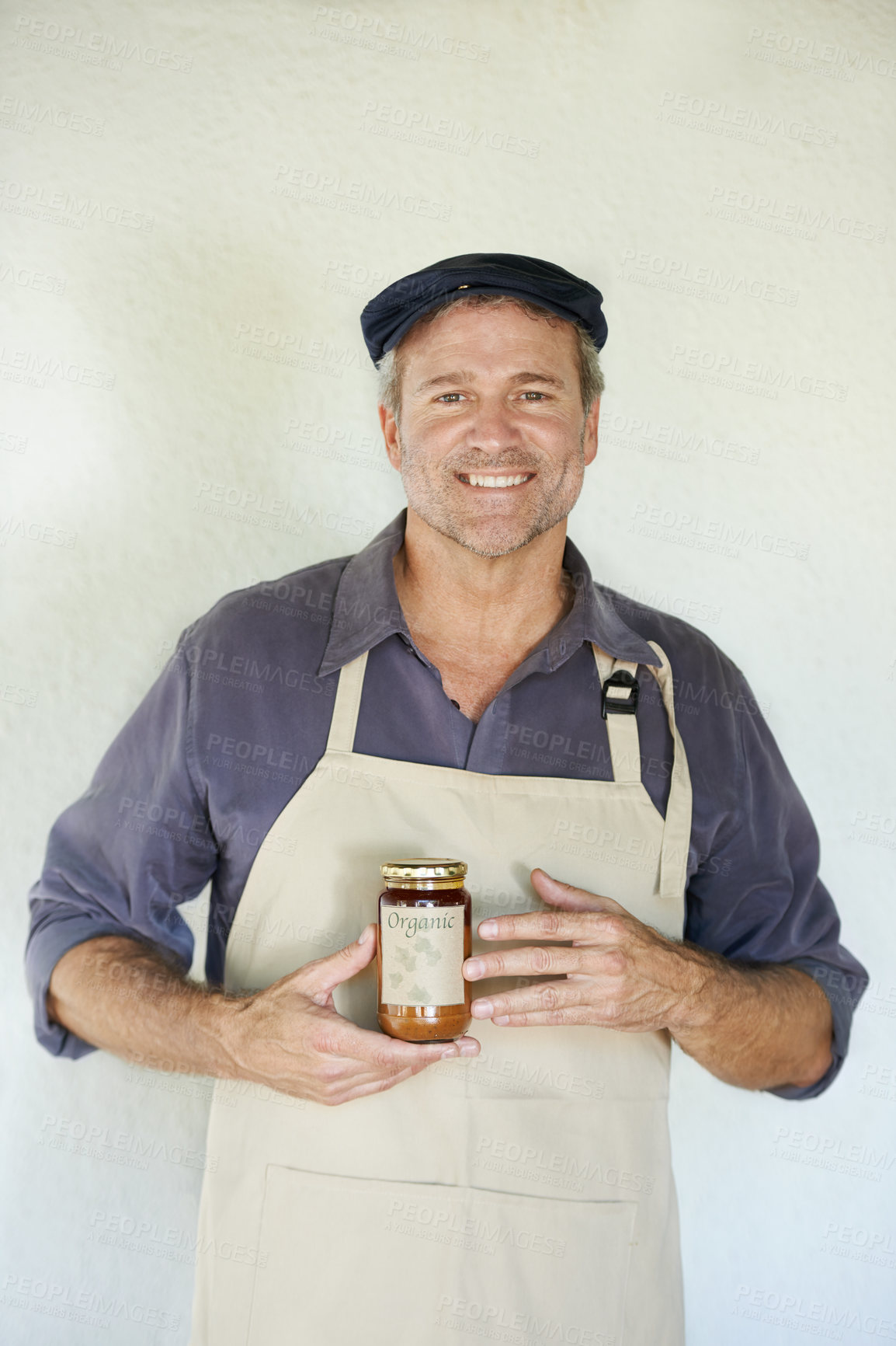 Buy stock photo Man, portrait and happy with organic jam for biodiversity,  sustainability and eco friendly in home. Preserver, smile and natural fruit spread for quality, health and wellness on white background