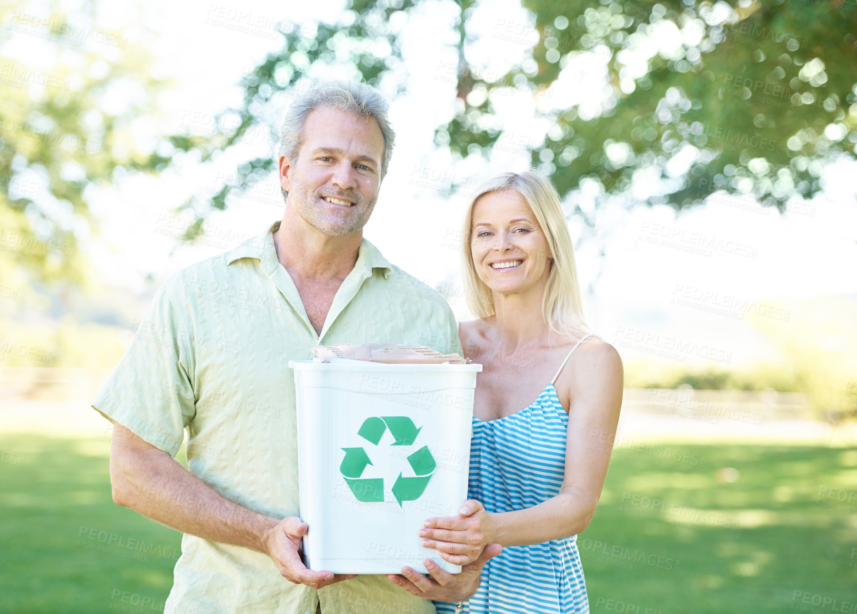 Buy stock photo Couple, park and recycling bin for nature, cleanup or eco friendly growth for clean earth. People, portrait and smile for sustainability, ecology or responsible trash removal for hope or conservation