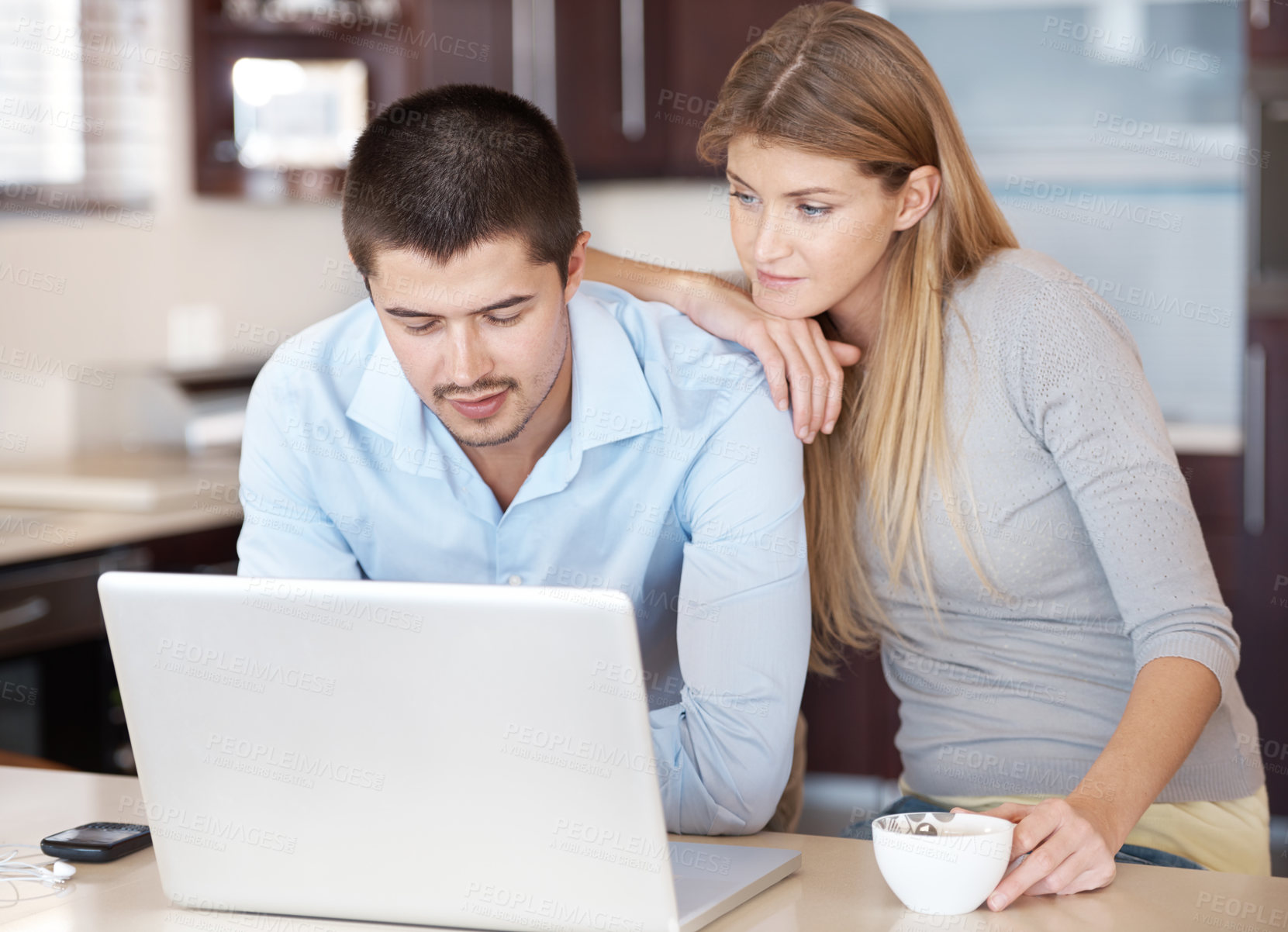 Buy stock photo Couple, home and laptop for reading news, planning and online shopping in kitchen with coffee. Woman and man on computer with e commerce software or website for information, registration or sign up
