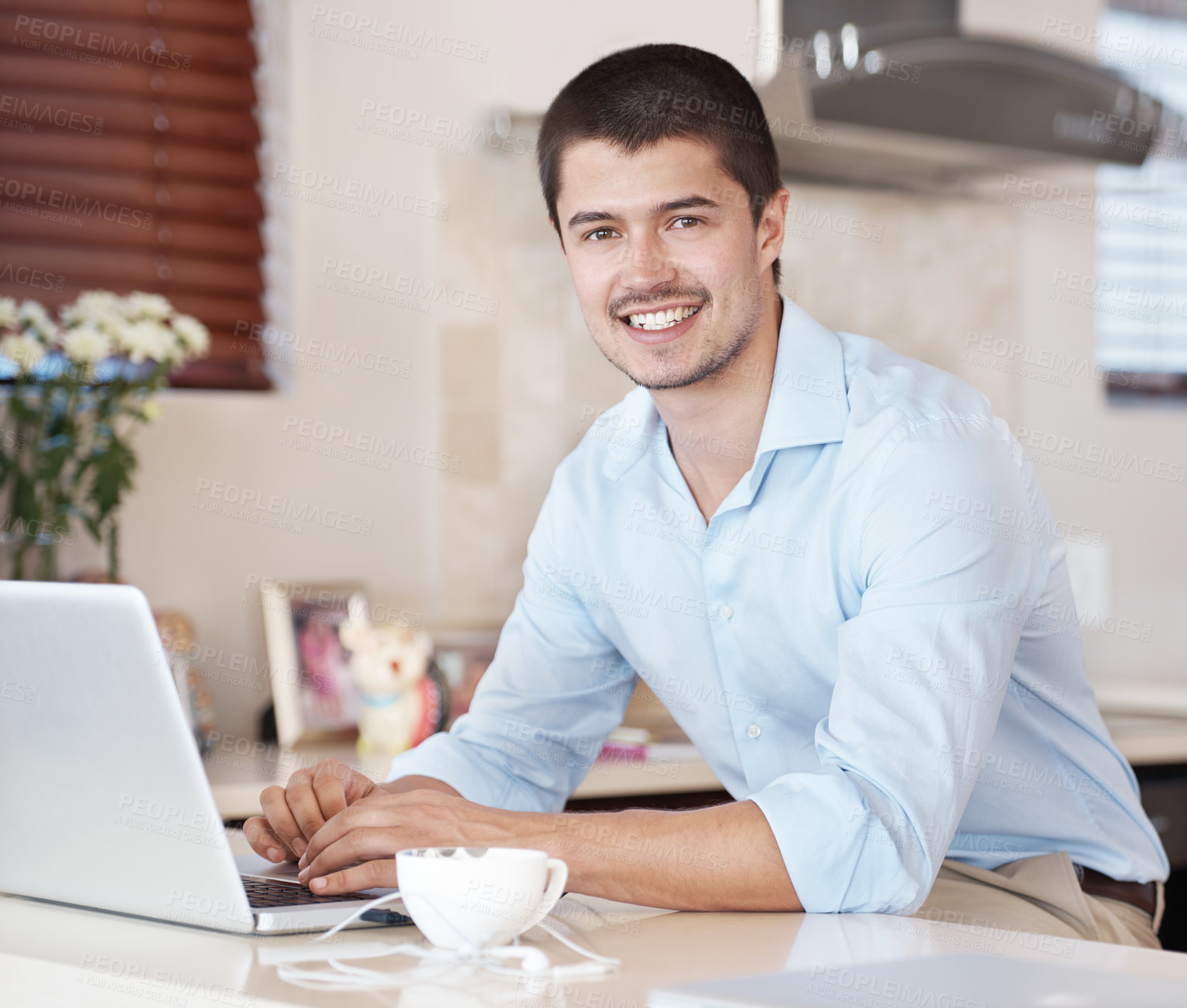 Buy stock photo Business man, kitchen and computer for work from home, online planning and software at counter. Portrait of worker, freelancer or entrepreneur on laptop for information technology opportunity in USA