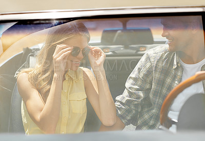 Buy stock photo Road trip, sunglasses and travel with couple in car together for holiday, journey or vacation. Happy, love or smile with man and woman in vehicle for transportation to destination and location