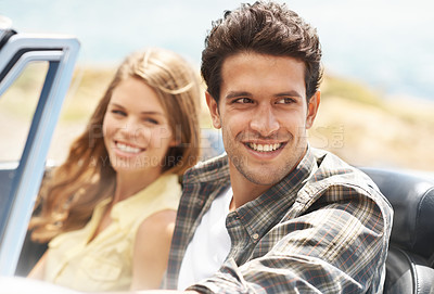 Buy stock photo Couple, happy and road trip in car for travel, drive and journey with explore, adventure or vacation. People, smile and date in convertible with driving for crazy summer, holiday and freedom outdoor