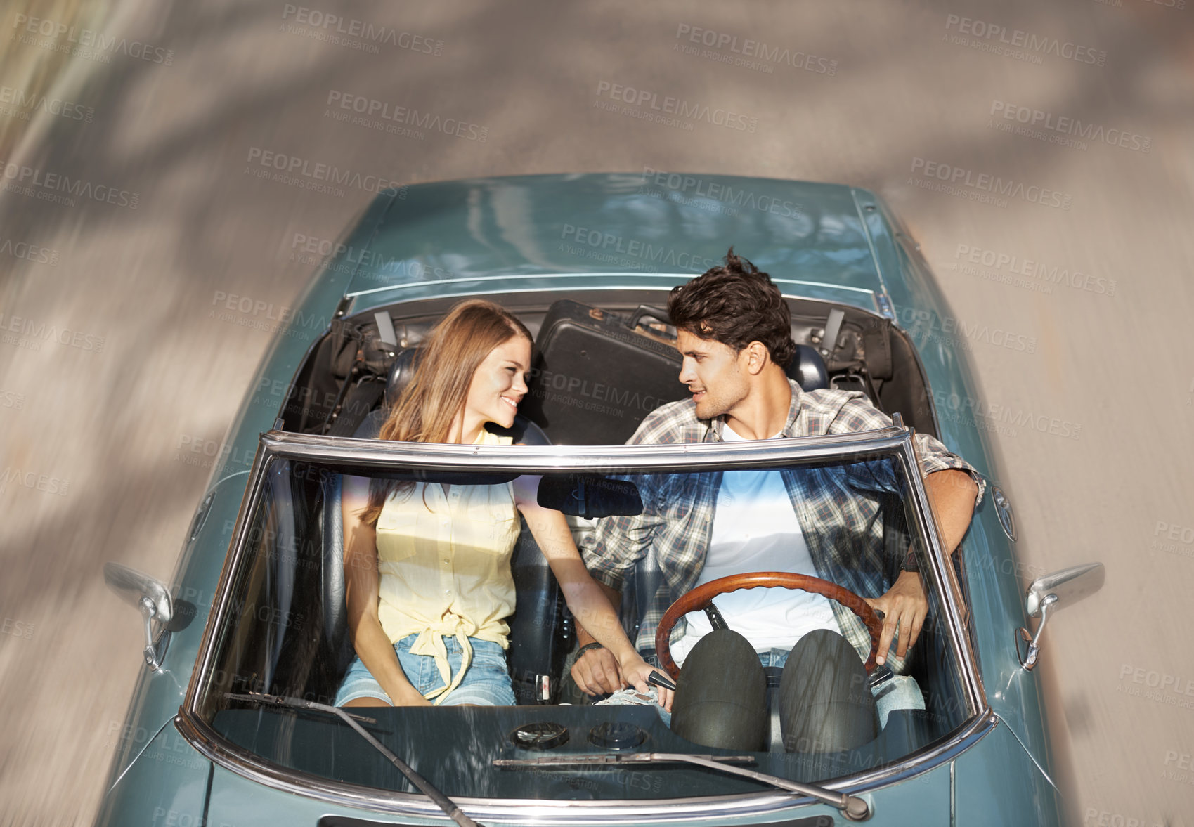 Buy stock photo Happy, couple and drive with road trip in car for summer adventure, romance and bonding on anniversary. Top view, man and woman with smile in motor vehicle for weekend, travel and outdoor journey