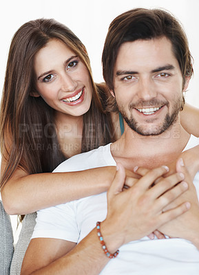 Buy stock photo Smile, hug and portrait of couple in studio together with romance, commitment and marriage support. Love, man and happy woman embrace with relationship trust, care and partnership on white background