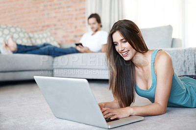 Buy stock photo Happy, woman and floor with laptop at home in living room to relax by browse or streaming internet for entertainment. Smile, female person and digital technology in lounge for reading blog on website