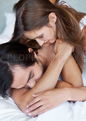 Buy stock photo Couple, hug and sleeping on bed together, dreaming and relax in home on weekend for bonding. People, embrace and rest in bedroom for love and affection in marriage, relationship and care in nap