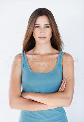 Buy stock photo Fashion, crossed arms and portrait of woman on a white background with trendy, stylish and casual clothes. Attitude, beauty and girl fashion model isolated in studio in retro and summer style