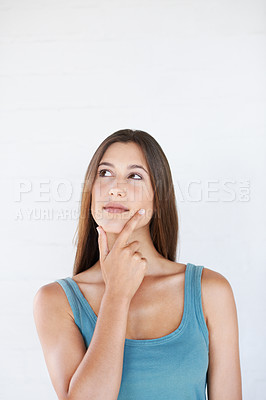 Buy stock photo Hand, woman and thinking in studio with an idea, vision and decision on white background space. Ideas, choice and girl planning, pensive and thoughtful while standing, contemplate and isolated