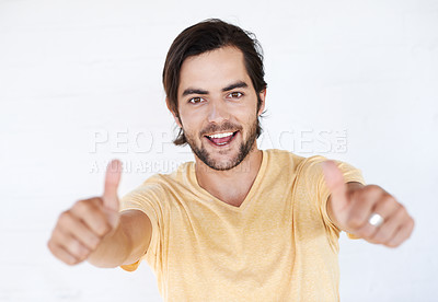 Buy stock photo Thumbs up, success and portrait of man in white background, studio or isolated emoji. Male model, thumb up and support of yes agreement, celebration and hand sign, vote or trust, thank you and winner