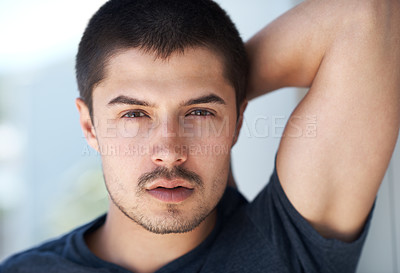 Buy stock photo Confidence, serious and portrait of a man in house for relaxing, chill and pride in apartment. Sexy, flirting and face closeup of person with confident attitude, attractive and handsome in home