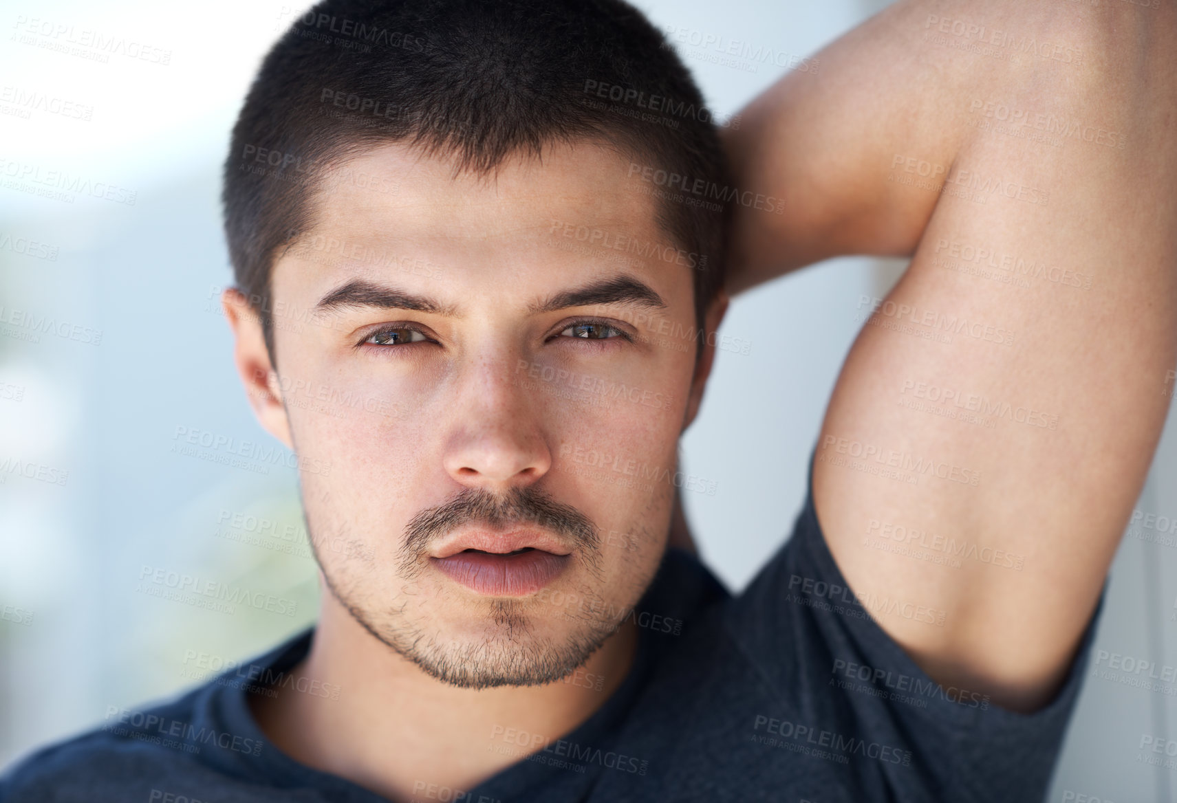 Buy stock photo Confidence, serious and portrait of a man in house for relaxing, chill and pride in apartment. Sexy, flirting and face closeup of person with confident attitude, attractive and handsome in home