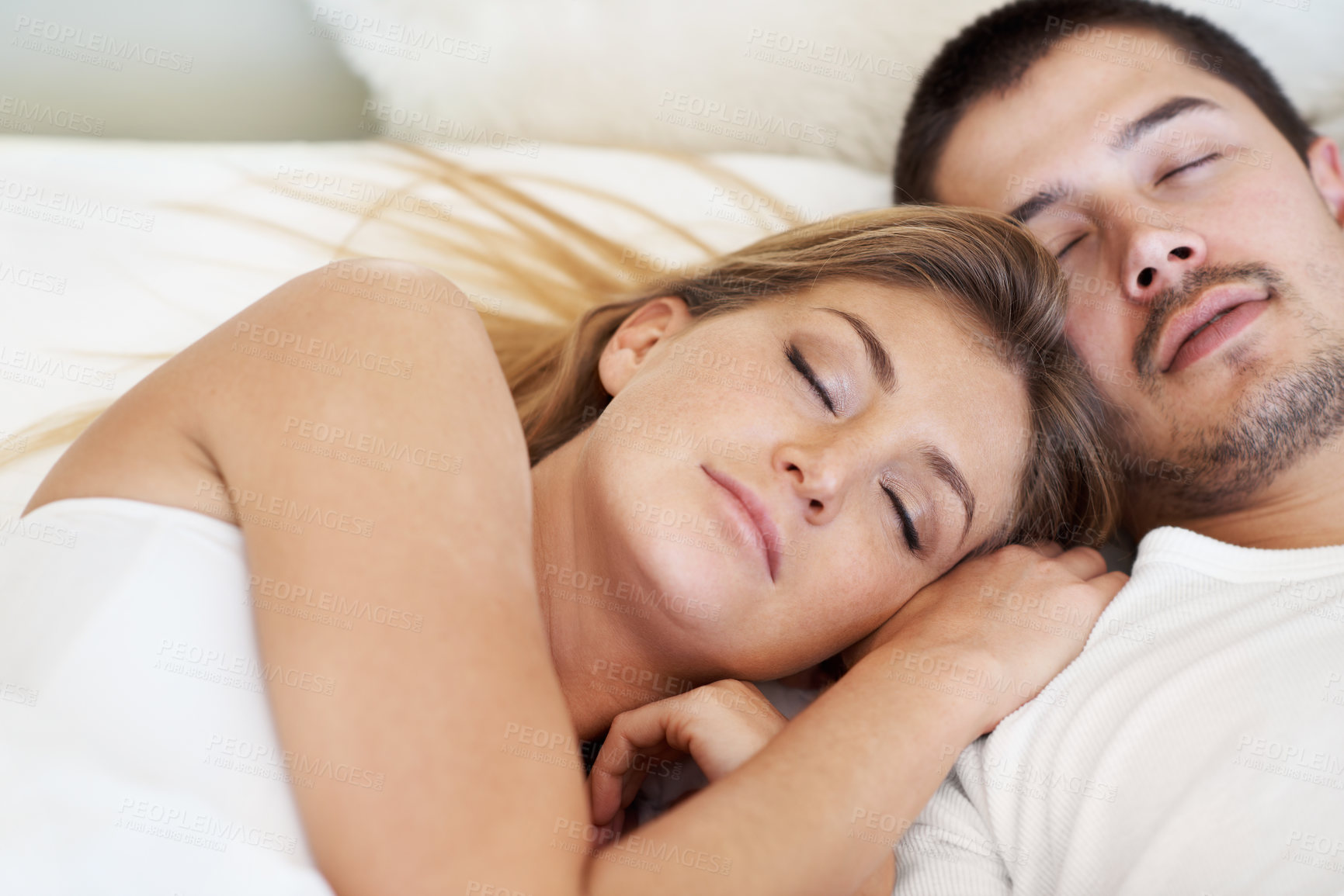 Buy stock photo Attractive young couple fast asleep together in bed