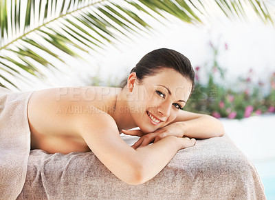 Buy stock photo Portrait, smile and woman on massage table for relax, skincare and luxury wellness in outdoor spa. Female person, zen and lying on bed for holistic treatment, body detox and peace in beauty salon