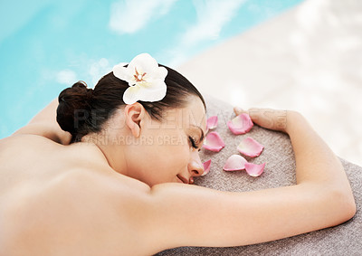 Buy stock photo Sleep, flower petal and woman with massage at spa for hospitality, service and luxury hotel satisfaction. Stress free, relax and zen female person with peace for self care, holiday and body treatment