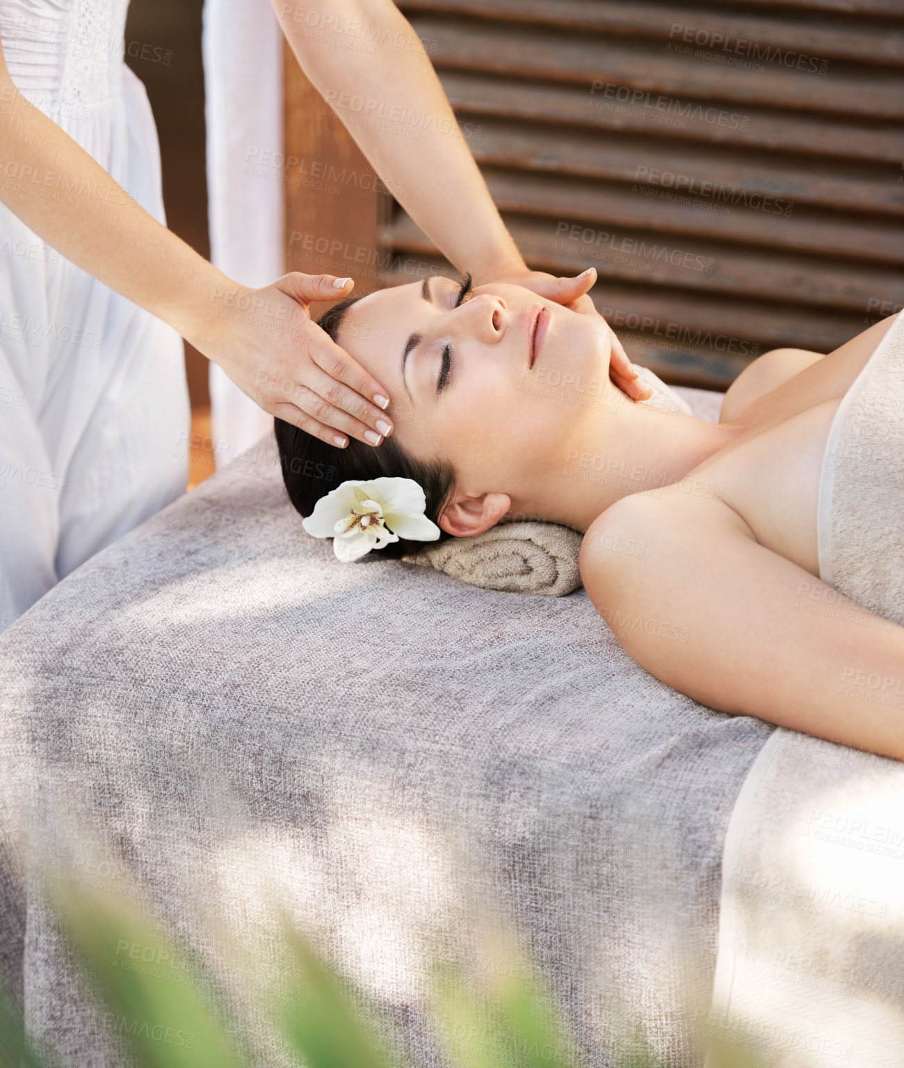 Buy stock photo Woman, calm or hands for facial massage, peace and wellness for outdoor skincare treatment. Zen person resting, masseuse and sleeping for therapy, holistic healing and service at hotel or beauty spa