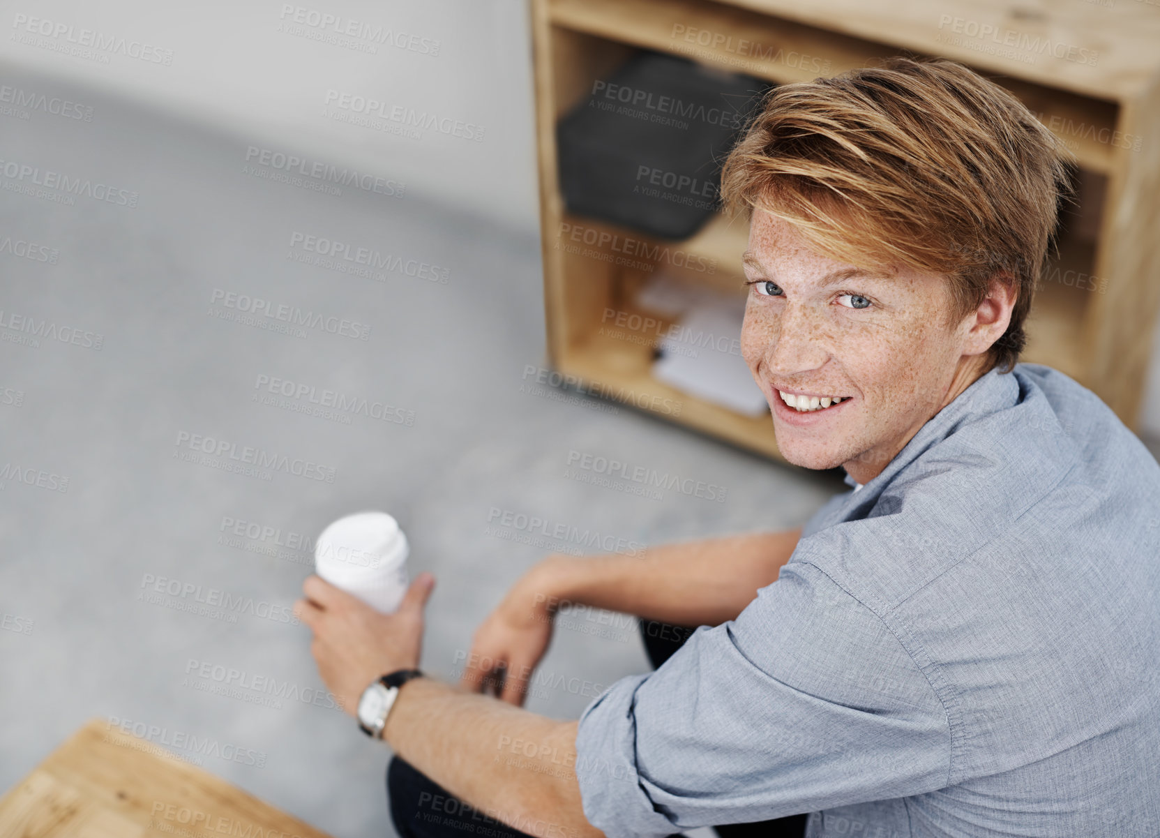 Buy stock photo Portrait, business and man with coffee in office, graphic designer and startup for creative agency. Face, person and entrepreneur with morning tea, relax and break for cappuccino, smile and happiness