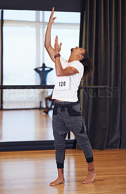 Buy stock photo Man, dance and movement in studio for audition, performance or artistic casting for competition. African person, creative or stretch body for rhythm or routine indoor for ballet or jazz entertainment