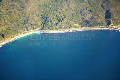 Buy stock photo Nature, ocean and above of island coast by mountain for tropical destination, holiday and vacation. Natural background, travel and aerial of sea for scenic view for landscape, beach and environment