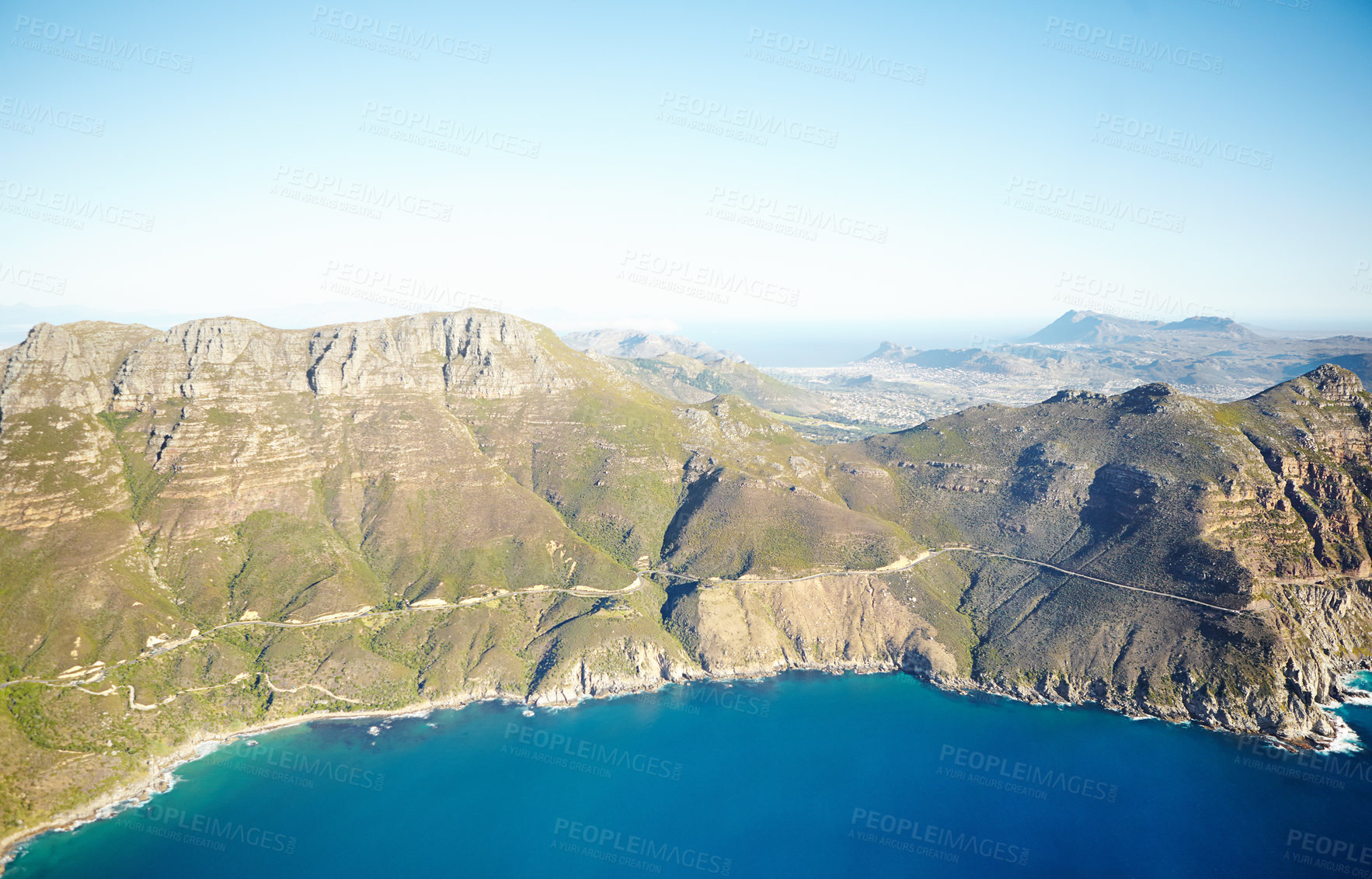 Buy stock photo Nature, ocean and island coast by mountain for tropical destination, holiday and adventure. Natural background, travel and blue sky, cliff and sea for scenic view for landscape, beach and environment