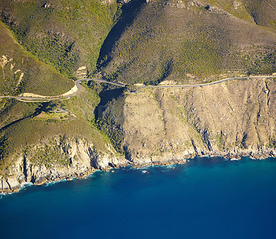 Buy stock photo Nature, ocean and above of coast by mountain for tropical destination, holiday and vacation. Natural background, travel and aerial of island sea for scenic view for landscape, beach and environment