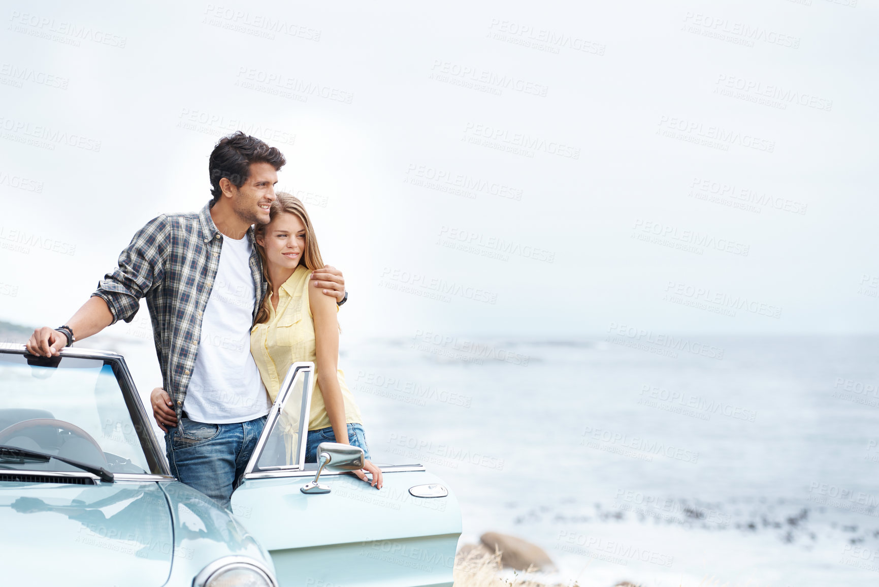 Buy stock photo Sea, view and happy couple hug on road trip in nature together for peace, travel or adventure. Thinking, mockup space and people in car on vacation for journey, love and honeymoon romance in Italy