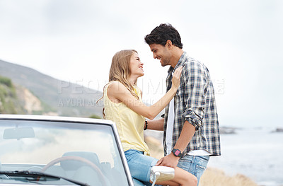 Buy stock photo Beach, romantic and happy couple on road trip on holiday together for break, love or adventure in nature. Memory, convertible and people in car vehicle for outdoor vacation for journey and honeymoon