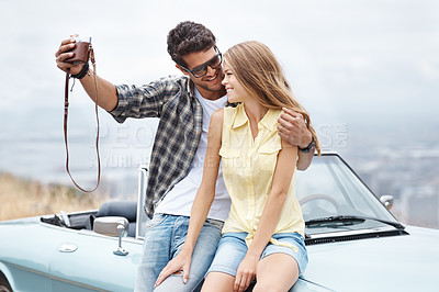 Buy stock photo Selfie, travel and couple by convertible car for road trip with social media, holiday journey and happy memory for honeymoon. Vintage camera, man and woman for picture by motor for vacation in France