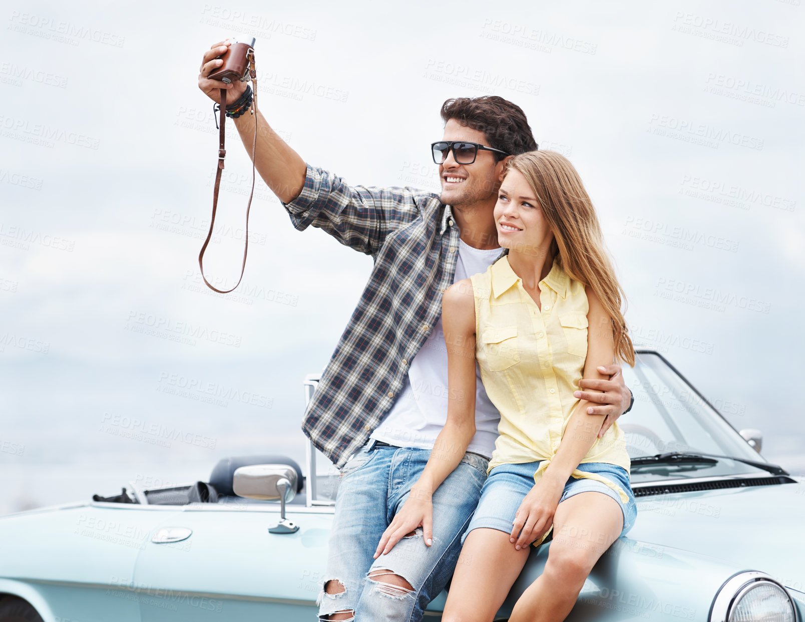 Buy stock photo Couple, happy selfie and outdoor for vacation for love with camera, freedom and romance together. Care, man and woman travel for holiday, bonding journey and outside by car smile for road trip