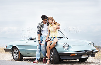 Buy stock photo Love, car and couple with camera for holiday, road trip journey and happiness for relationship trust. Outdoor, man and woman by auto convertible with photography and honeymoon vacation in France