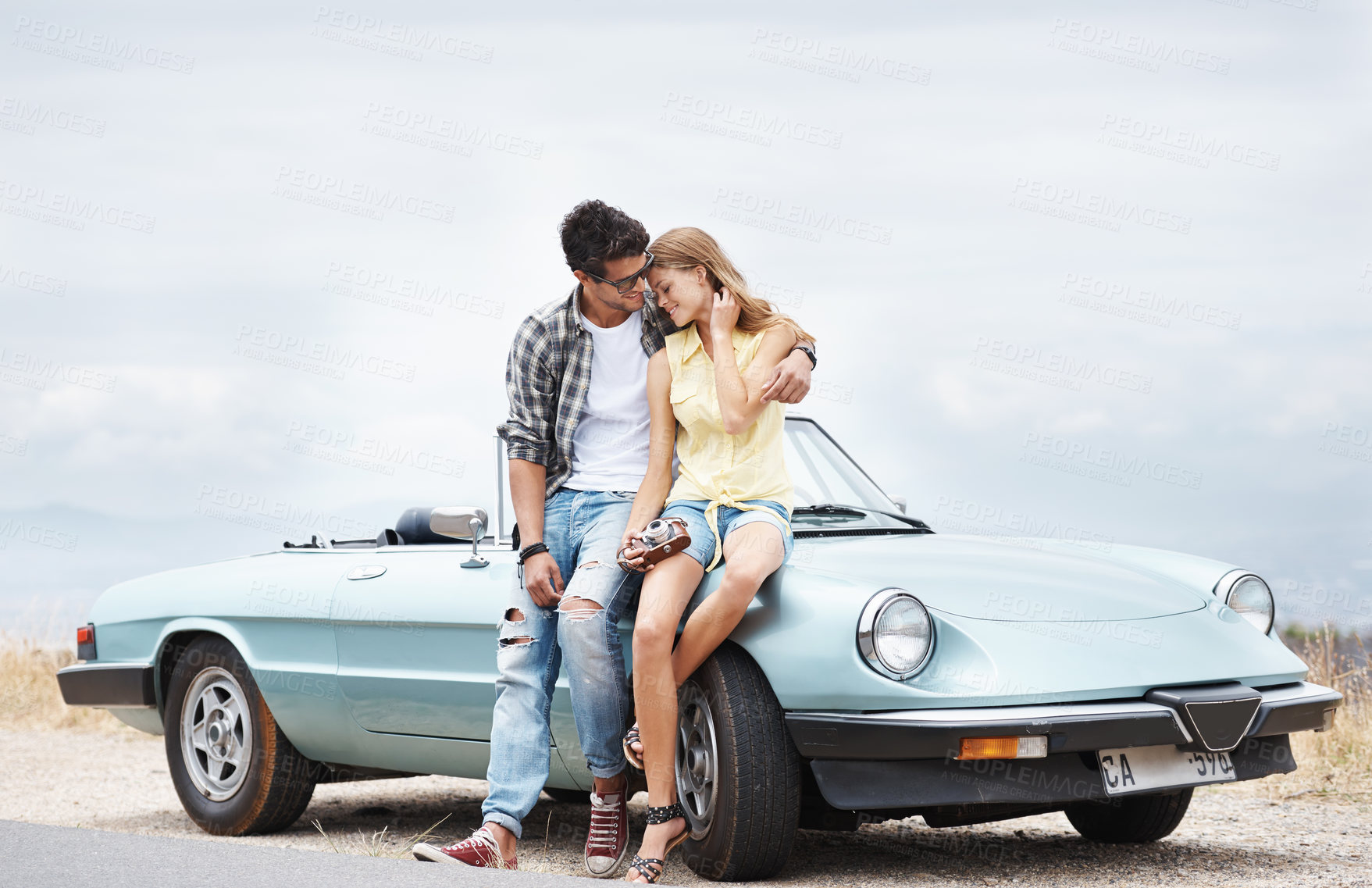 Buy stock photo Love, car and couple with camera for holiday, road trip journey and happiness for relationship trust. Outdoor, man and woman by auto convertible with photography and honeymoon vacation in France