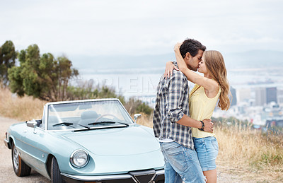 Buy stock photo Road trip, kiss and couple in car in city on holiday, vacation and adventure for bonding, romance and love. Travel destination, dating and man and woman embrace for transport, journey and together