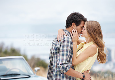 Buy stock photo Road trip, kiss and couple travel in city on holiday, vacation and adventure for bonding, romance and love. Destination, dating and man and woman embrace for transport, journey and together by car